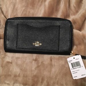 Coach Wallet. Black with Gold accents.
